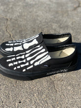 Load image into Gallery viewer, Vans slip ons black unisex skeleton feet